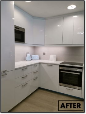 A white kitchen with a stove, microwave, and toaster oven. 